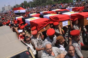 Funeral takes place in Cairo for the soldiers killed by gunmen near the border with Israel at Rafah. After this attack Morsy sacked several head figures in North Sinai and retired Hussein Tantawi, defence minister at the time  Mohamed Omar