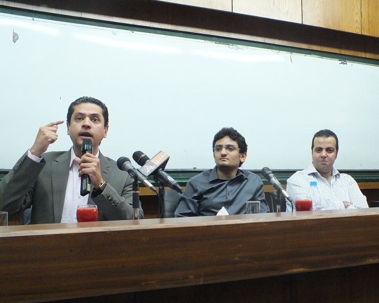 Abdel Rahman Youssef (left), Wael Ghoneim (center) and Mostafa Al-Naggar (right) discuss the political structure of Egypt with the students of Cairo University Fady Salah / DNE