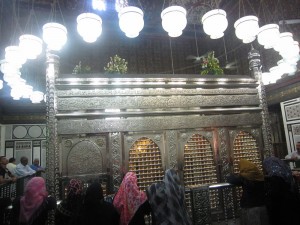 Women seeking blessings at Al Hussein Mausoleum  Sarah El Masry