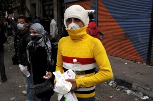 A volunteer provides medical assistance to protesters on Mohammed Mahmoud street in November 2011 Laurence Underhill / DNE