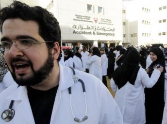 Doctors and nurses protest outside Salmaniya Medical Complex in Bahrain's capital. AFP Photo/ Joseph Eid