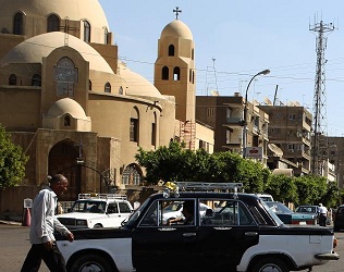 Two Copts were injured as a result of violence brought about by the predominantly conservative Muslim crowd barring the entrance. (KHALED DESOUKI/ AFP PHOTO / GETTY IMAGES)