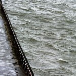 A woman walks down the promenade along the East River in New York on October 29, 2012 as New Yorkers venture out as Hurricane Sandy prepares to make landfall. (Timothy A. Clary / AFP / Getty Images)