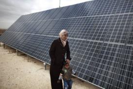 The ministry plans to use solar energy stations to produce 100 MW per year. (AFP PHOTO / Menahem Kahana)