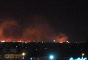 Fire rages at the state-owned Yarmouk military factory in southern Khartoum, Sudan. (AFP PHOTO)