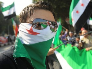 Syrians living in Jordan protest against Syria's President Bashar Al-Assad outside the U.N. office in Amman. (AFP Photo)