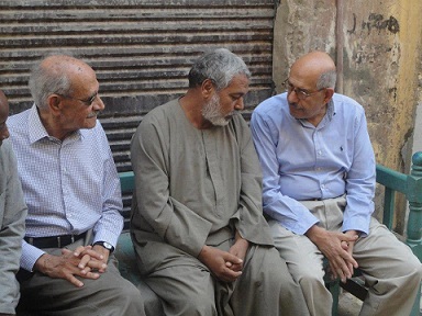 Mohamed ElBaradei (right) visits Aswan and talks to the father of Mohamed Mohsen, a young man who died in July during clashes near to the Ministry of Defense buildings in the Abbasseya district of Cairo. (DOSTOR PARTY FACEBOOK PAGE)