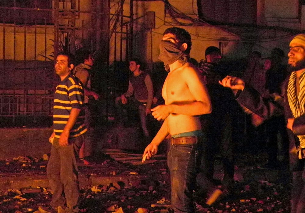 Fighting breaks out near Mohamed Mahmoud Street as stone throwers confront security forces (Photo by Laurence Underhill)