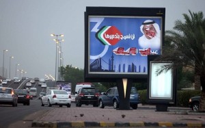 A defaced billboard for a candidate in the upcoming Kuwaiti parliamentary elections is seen at the side of a main road in Kuwait City. (AFP Photo / Yasser Al-Zayyat) 