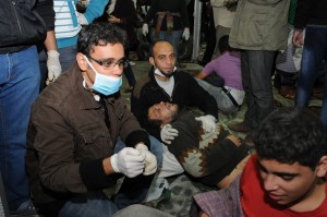 Volunteers treat casualties of the fighting in a field hospital established near Mohamed Mahmoud Street Laurence Underhill