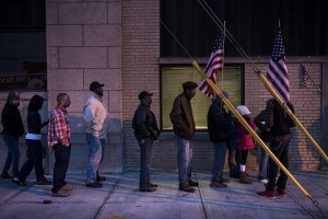 Voters wait in front of the Mt. Pleasant Library November 6, 2012 in Cleveland, Ohio. (AFP PHOTO / BRENDAN SMIALOWSKI)