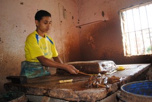 Soaked papyrus is flattened before being lined up in sheets Abdel-Rahman Sherief