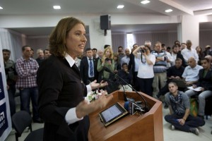 Israel's former foreign minister Tzipi Livni announces her return to politics during a press conference in Tel Aviv on 27 November. (AFP PHOTO/ MENAHEM KAHANA)