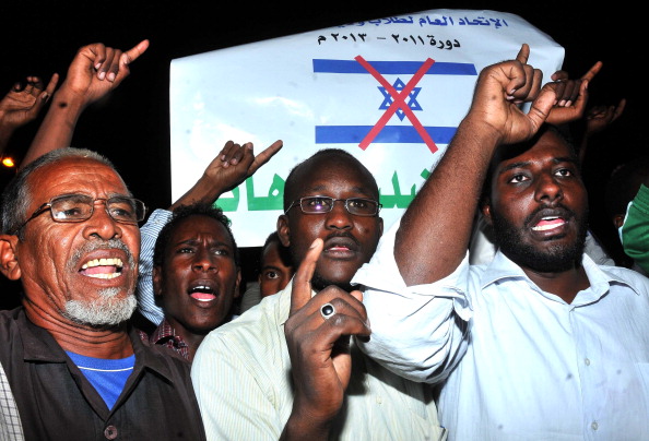 Sudanese demonstrators hold banners and chant anti-Israeli slogans during a protest in Khartoum on October 24, 2012. (EBRAHIM HAMID / AFP / Getty Images)