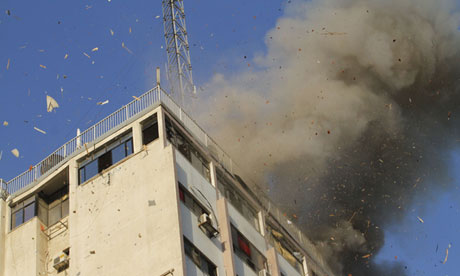 Smoke rises after an Israeli air strike on an office of Hamas television channel al-Aqsa in Gaza City Photograph. (AFP PHOTO / GETTY IMAGES / Mohammed Abed)