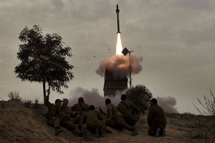 An Israeli defence missile is launched to block incoming rockets from Gaza. (AFP PHOTO / MENAHEM KAHANA)