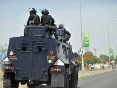 Nigerian police enforcing a curfew in the capital of Bauchi state, northern Nigeria in 2011. (AFP / FILE PHOTO, Tony Karumba)