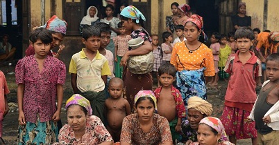 This picture taken on Oct 11, 2012 shows Muslim Rohingyas in the courtyard of a school sheltering Internally Displaced Persons (IDP) in the village of Theik Kayk Pyim, located on the outskirts of Sittwe, capital of Myanmar’s western Rakhine state. (AFP PHOTO)