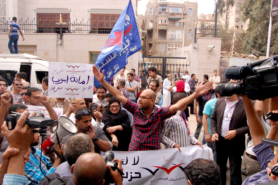 Members of the Free Egyptian Party march through Zamelek calling on President Morsy to take a stance on the violence against Muslims in Myanmar (Photo by Joel Gulhane)