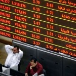 The EGX’s weekly stock market summary showed that the total value of shares for companies listed dropped EGP 5.491bn last week, from EGP 380.950bn to EGP 386.441bn.(File Photo) (AFP Photo / Mahmoud Khaled)