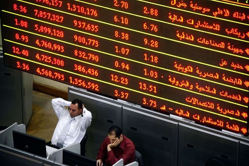 The EGX’s weekly stock market summary showed that the total value of shares for companies listed dropped EGP 5.491bn last week, from EGP 380.950bn to EGP 386.441bn.(File Photo) (AFP Photo / Mahmoud Khaled)