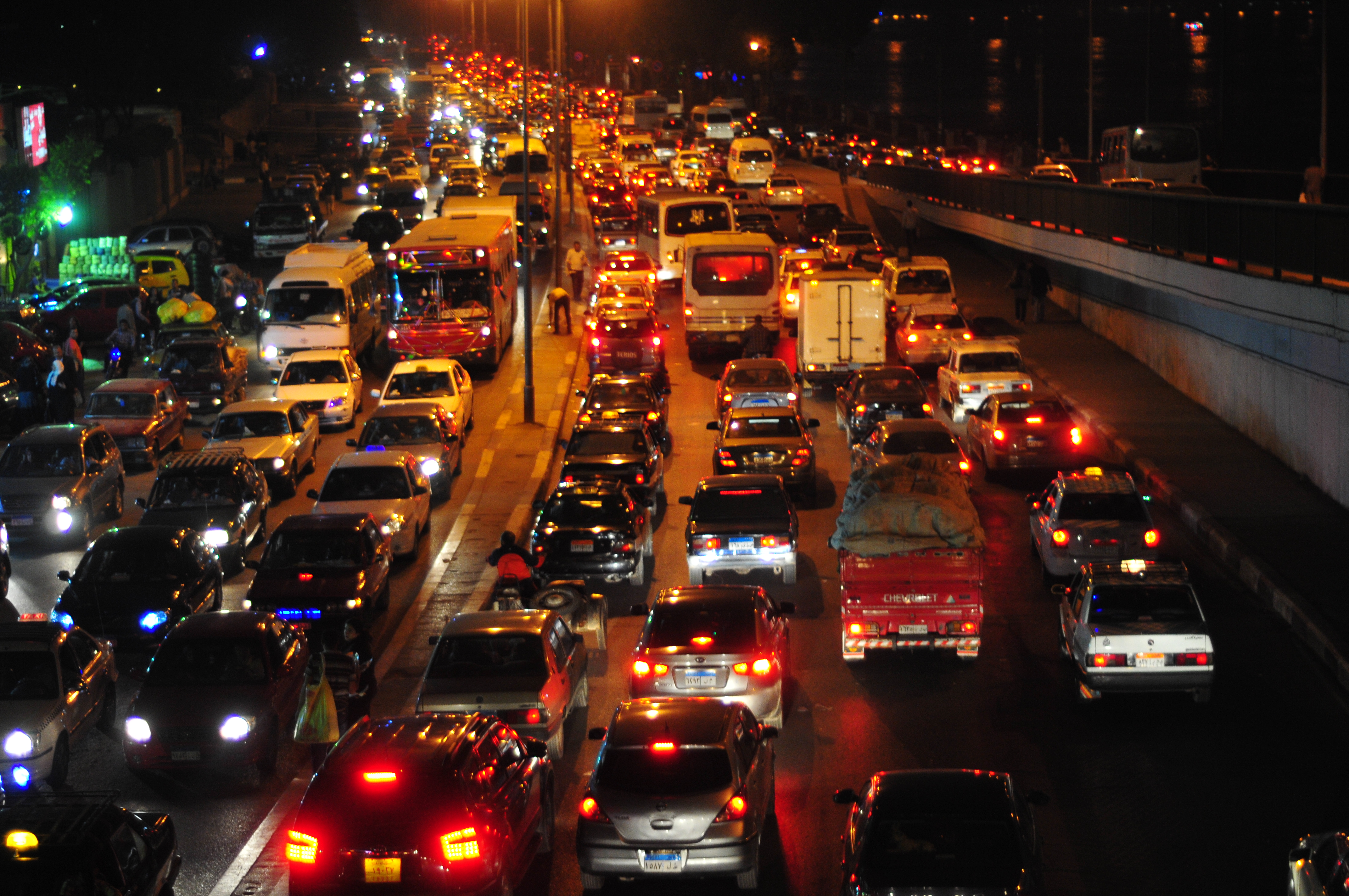 Traffic Congestion during night in Cairo, hinders cab drivers from making enough money to cover their families’ expenses (DNE/Hassan Ibrahim)
