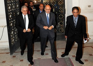 Hamdeen Sabahy, left, and Mohamed ElBaradei, centre, arrive for a meeting of the National Salvation Front (File photo) (Photo by Mohamed Omar)