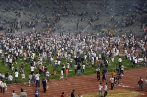 Fans invaded the pitch at Cairo Stadium during an African Champions League clash in 2011.(AFP PHOTO)