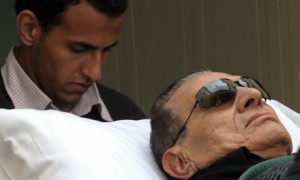 Former Egyptian president Hosni Mubarak was wheeled on a stretcher into court for trial earlier this year (AFP File Photo)