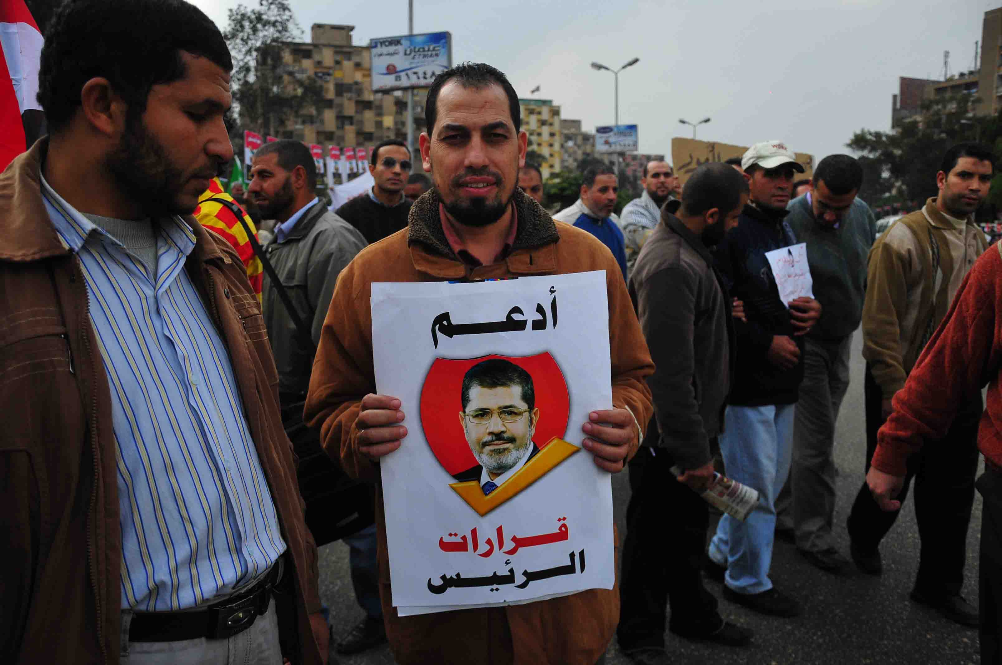 President Morsy supporters demonstrate by Rabaa Al-Adawiya Mosque in Heliopolis (Photo by Hassan Ibrahim)