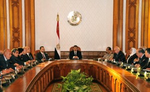 President Morsy (C) with his ministers following the swearing in ceremony of the new Egyptian cabinet at the presidential palace in Cairo. (AFP PHOTO/ EGYPTIAN PRESIDENCY)