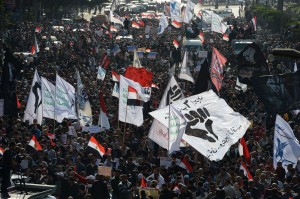Egyptian protestors march to Tahrir Square on 25 January 2013. Groups have called for marches to the Shura Council to coincide with the second anniversary of the Friday of Rage. (AFP Photo / Khaled Desouki)