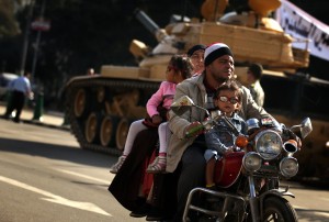 Egyptian families after the revolution have experienced changes from mere stress to struggling to earn a living to involvement in politics  AFP- Patrick Baz 