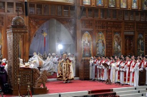 Newly elected leader of Egypt's Coptic Christian, Pope Tawadros II, (C) Head of the Egyptian Coptic Orthodox Church, leads the Coptic Christmas midnight mass at the al-Abasseya Cathedral in Cairo late on January 6, 2013. Copts of Egypt celebrate their first Christmas since the country has been ruled by Islamists in a climate of concern despite assurances from the authorities.(AFP PHOTO/KHALED DESOUKI)