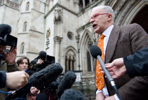 Phil Shiner of Public Interest Lawyers outlines his case against the Ministry of Defence to members of the media as he stands outside the High Court in central London on January 29, 2013. AFP PHOTO/Leon Neal