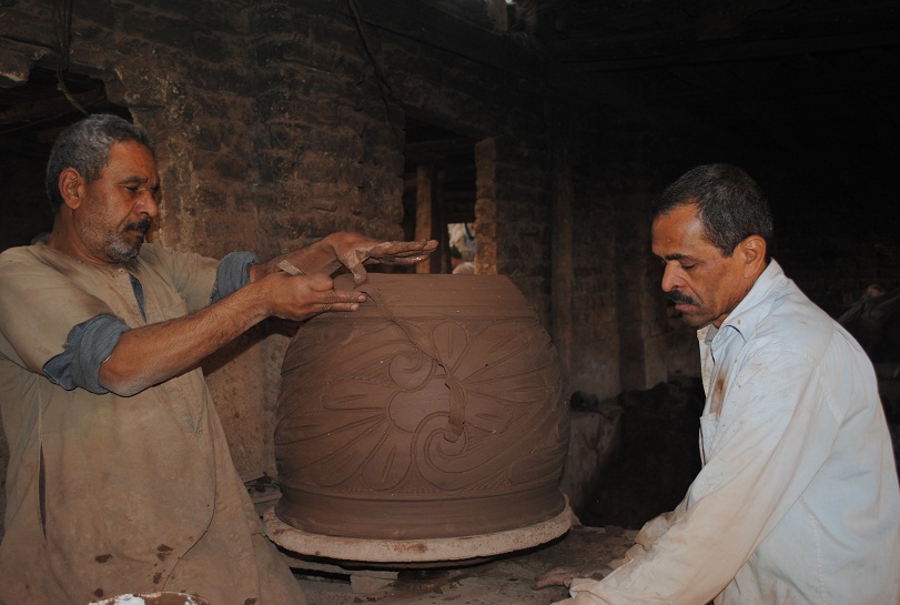 Anwar working on a large pot Abdel-Rahman Sherief