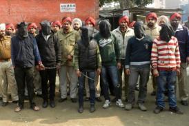 Indian police escort the six men accused of a gang rape in Punjab to a courthouse in Gurdaspur on 13 January 2013. (AFP PHOTO)