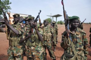 Sudanese Peoples Liberation Army (SPLA) soldiers pose at a base near Bentiu on April 23, 2012 (AFP/File, Hannah Mcneish)