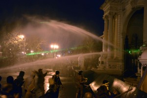 During the “Kesh Malek” (“Checkmate”) protests on Friday, violence erupted between demonstrators and security forces using water cannons and teargas to disperse protesters throwing rocks in front of Al-Qubba palace. AFP PHOTO / MOHAMED EL-SHAHED