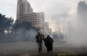 The Semiramis amid clouds of teargas during clashesAFP PHOTO/MOHAMMED ABED