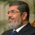 In response to questions on whether the Muslim Brotherhood influences his presidential decisions, Morsi said that his “background with the Brotherhood is part of my psychology, humanity and belief”. (AFP Photo)