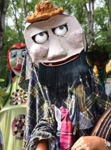 Masks and puppets on parade