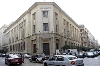 Some people criticised Central Bank policies after the 25 January Revolution, and that it had been helped by Egyptian banks to help businessmen to smuggle their money deposited in banks abroad (File Photo) (AFP Photo)