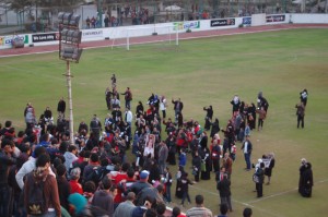 Families of victims of the Port Said stadium disaster participate in a memorial ceremony at Al-Ahly football ground (Joel Gulhane) 