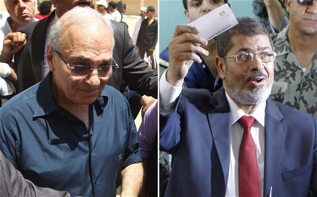 The results showed that Mohamed Morsi and Ahmed Shafiq received more media attention than other candidates in the first round of elections. Photo: Mohamed Morsi and Ahmed Shafiq during the last presidential elections (AFP Photo)