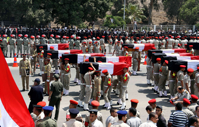 Funeral of Egyptian border guards killed last August (AFP Photo)