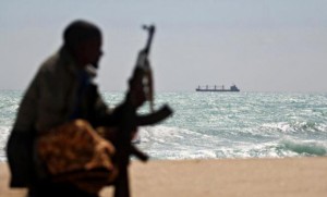 An armed Somali pirate along the coastline. (AFP Photo)
