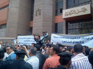 Thousands of workers from the Ideal Company protested at the State Council on Monday, ahead of the Investments Court’s verdict on the lawsuit demanding the reversal of a decision to privatise the company. (Photo by : Fady Salah)