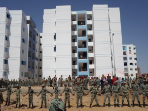 Army personnel surrounding residential housing units in Suez after evacuating them  (Photo by: Hassan Ghonema) 