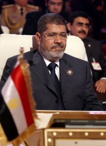 Egyptian President Mohamed Morsi attends the opening of the Arab League summit in the Qatari capital Doha  (AFP Photo)